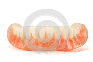 Close-up of plastic denture teeth isolate no fond background. Ne