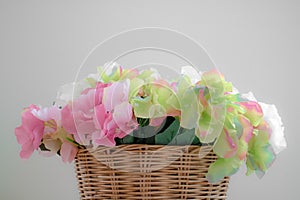 Close-up of plastic flowers basket