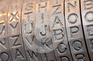 Close-up of plastic parts printed on a 3D printer, round letters rings for cryptex.