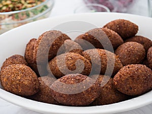 Close-up of a plate with kibbe, a famous arabic food photo
