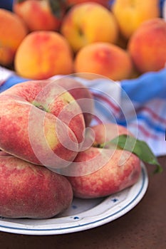 Different summer fruits such as the Paraguayan peach and the yellow peach photo