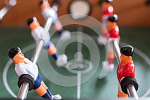 Close up player in table football soccer game