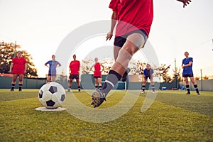 Close Up Of Player Taking Penalty During Womens Soccer Match