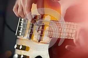 Close Up Playing Bass Guitar