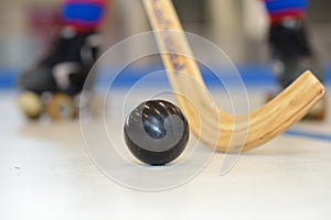 Close up playing roller hockey