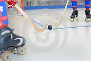 Close up playing roller hockey
