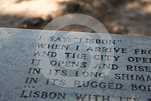 Close-up of Poem Engraved on Bench inside Castle of Sao Jorge in