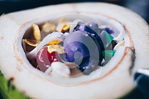 Close up of the popular and favorite Filipino cold dessert `Buko` or Coconut Halo-halo also spelled haluhalo.