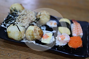 Close-up, popular Japanese food set, sushi, salmon rice ball, fresh sweet egg, delicious to eat, good food concept