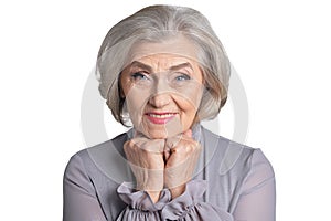 Close up porait of emotional senior woman posing photo