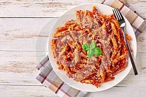 Close-up of a portion of penne arrabiata