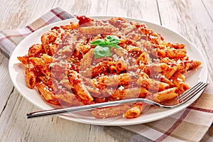 Close-up of a portion of penne arrabiata