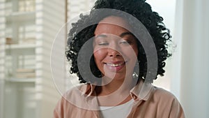 Close up portrait African American ethnic woman happy smiling girl beautiful millennial lady curly hairstyle female