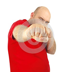 Close up portrait of a aggressive man showing his fist
