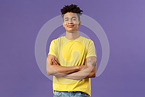 Close-up portrait of arrogant, proud and boastful young smart guy cross hands over chest in confident, self-assured pose