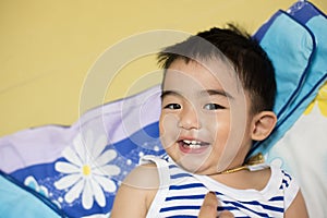 Close up portrait of Asian boy, Smiling action.