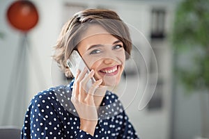 Close-up portrait of attractive cheerful girl finance specialist calling consulting client service at workplace