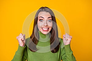 Close-up portrait of attractive lucky amazed cheerful girl great news reaction isolated over bright yellow color