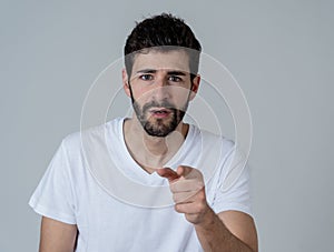 Close up portrait of attractive man surprised celebrating victory goal wining team or lottery