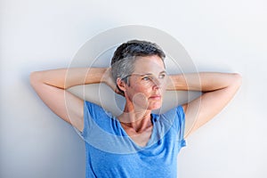Close up attractive mature woman staring in contemplation photo