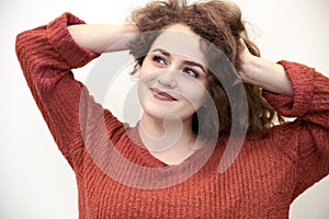 Close-up portrait of attractive striking young woman with long r