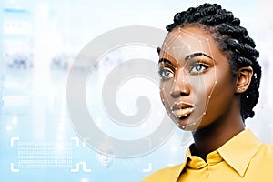 Female african face with conceptual face recognition scan. photo