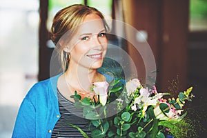 Close up portrait of beautiful blond woman with blue eyes