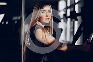 Close up portrait of a beautiful blonde woman with long hair smiling