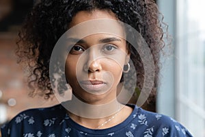 Close up portrait of beautiful confident millennial african american woman