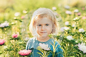 Close up portrait of beautiful joyful blonde girl child