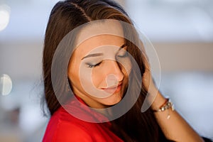 Close up portrait of beautiful long-haired woman