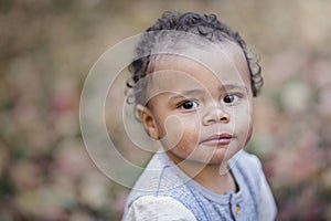 Close up Portrait of a beautiful mixed race little boy