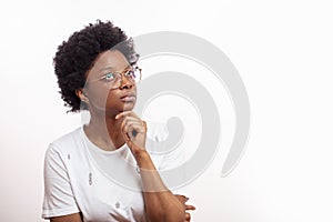 Close up portrait of beautiful pensive woman looking at the copy space