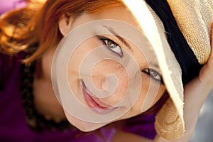 Close-up portrait of beautiful red-haired girl.