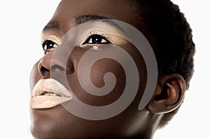 close-up portrait of beautiful sensual african american girl with white lips looking away