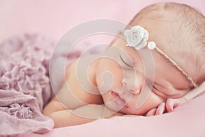 Close-up portrait of a beautiful sleeping baby.