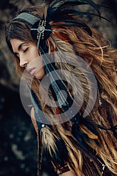 Close up portrait of beautiful tribal woman dancer in headdress