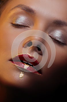 close-up portrait of a beautiful woman with red lipstick