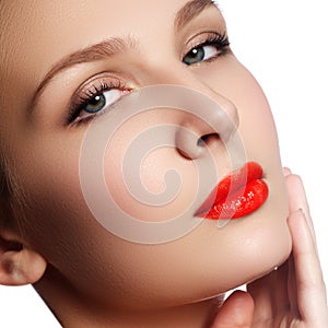 Close-up portrait of beautiful woman`s purity face with bright r