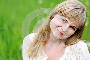 Close-up portrait of beautiful young blond woman