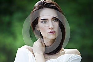 Close-up portrait of a beautiful young caucasian woman with clean skin, long hair and casual makeup