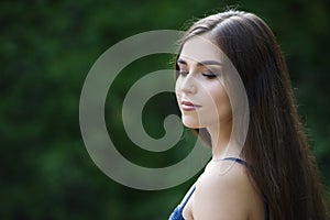 Close-up portrait of a beautiful young caucasian woman with clean skin, long hair and casual makeup