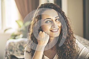 Close up portrait of a beautiful young woman smiling