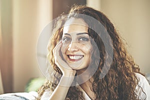 Close up portrait of a beautiful young woman smiling