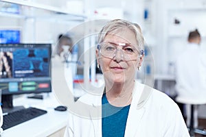 Close up portrait of biologist looking at camera