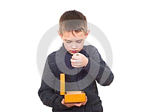 Close up portrait of boy counting money