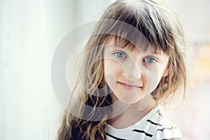 Close-up portrait of brunette child girl