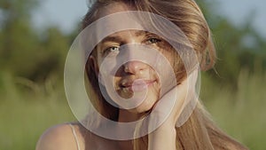 Close-up portrait of brunette positive woman smiling at camera. Beautiful face of charming beautiful Caucasian girl