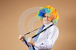 Close-up Portrait of business man in clown wig