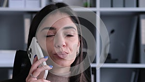 Close Up Portrait Of Caucasian Woman Talking Phone On Work